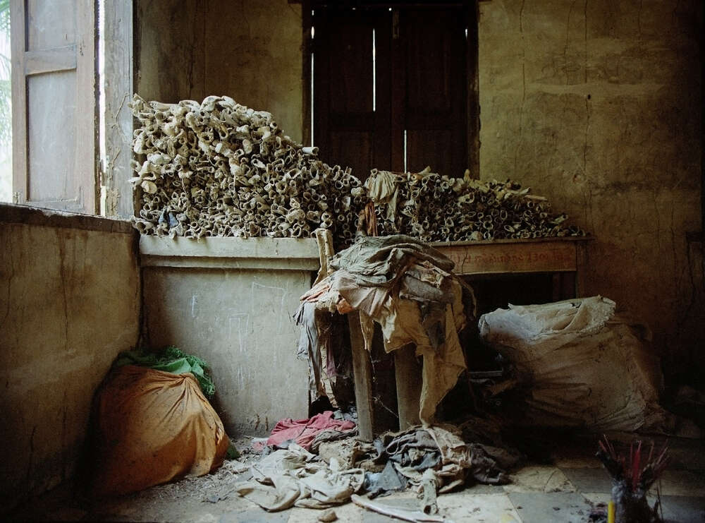 Neglected human bones at a temple, Battambang, 2004
